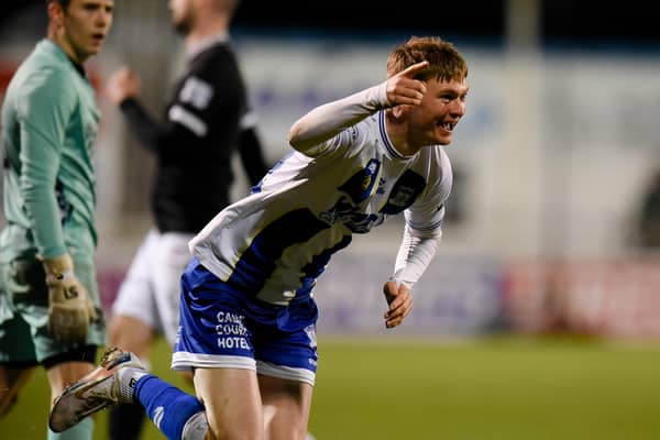 Newry City striker Ryan McNickle celebrates scoring against Bangor.