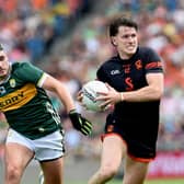 Armagh's Joe McElroy gets away from Kerry's Graham O'Sullivan during today's All-Ireland Quarter-final. Pics: John Merry