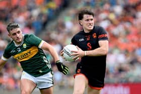 Armagh's Joe McElroy gets away from Kerry's Graham O'Sullivan during today's All-Ireland Quarter-final. Pics: John Merry