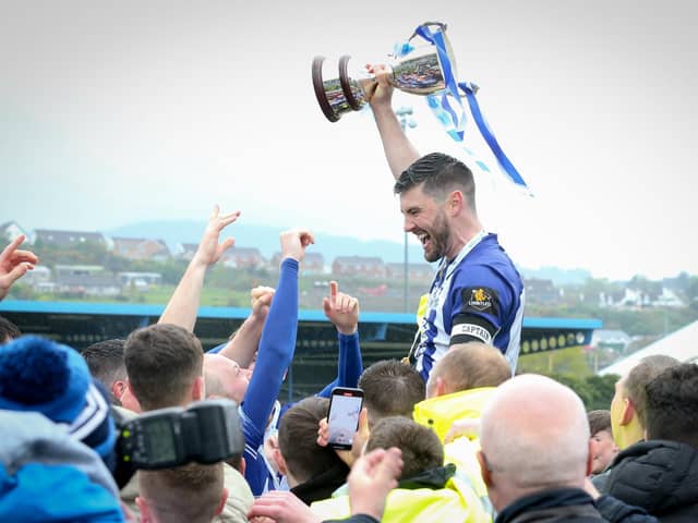 Press Eye - Belfast - Northern Ireland - 30th April 2022 Newry City FC captain Darren King picks up the Lough 41 Championship trophy at The Showgrounds in Newry.Photo by Matt Mackey / Press Eye.