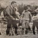 Sports day at Dromintee Primary School proved to be very successful in 1985 and all the events were keenly contested. In this picture the school's principal, Mr Gerry McQuaid, is preparing to start one of the boys' races.