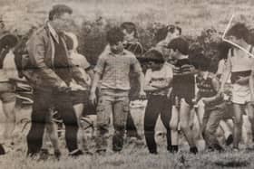 Sports day at Dromintee Primary School proved to be very successful in 1985 and all the events were keenly contested. In this picture the school's principal, Mr Gerry McQuaid, is preparing to start one of the boys' races.