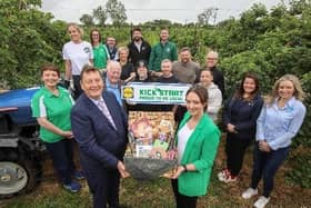 Back row L-R: Catherine McKeever (Long Meadow Cider), Helen Kettle (Mrs. K. Global), Alanna McKeever (Long Meadow Cider), Seamus McDaid (McDaid’s Football Special), (Symphonia Gin), Richard Robinson (Cloughbane Farm Foods), Brian McErlain (Berties Bakery). Row starting behind Michael: John O’Neill (Rosie’s Bakes), Lynne Murphy (Rosie’s Bakes), Tim McCarthy (Blackfire Food), Robert McGouran (Strangford Coffee), Darren Pritchard (Nocht), Perrine Bonnargent (Lecale Harvest), Esther Paul (Armagh Cider Company)