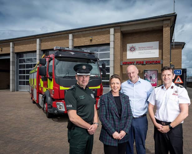Infrastructure Minister Liz Kimmins is pictured with members of the Road Safety Strategic Forum at Newry Fire Station.