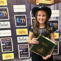 Nine-year -old  Amber Campbell wins 'Best Female Newcomer' at Northern Ireland Country Music Awards in Armagh.
