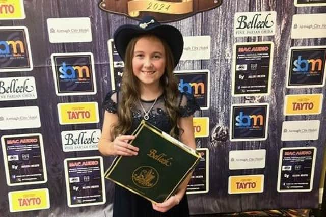 Nine-year -old  Amber Campbell wins 'Best Female Newcomer' at Northern Ireland Country Music Awards in Armagh.