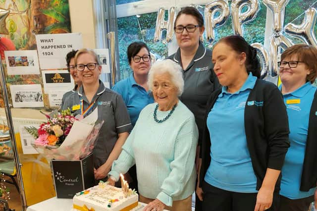 Orchard Centre staff with Maureen O'Hare, who celebrated her 100th birthday.