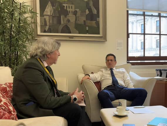 Mickey Brady chats with NIO Minister Steve Baker.