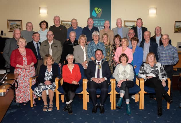 Newry, Mourne and Down District Council Chairperson, Councillor Pete Byrne pictured with volunteers and members of Society of St. Vincent de Paul at celebratory event in Council Offices in Monaghan Row.