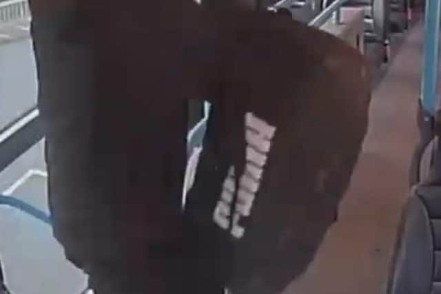 The PSNI have released an image, which appears to show the defendant carry the bag onto a bus on the evening of March 17, 2024.