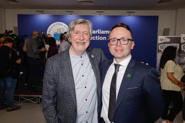 Newry and Armagh Sinn Fein candidate, Daire Hughes, wins the seat with a vote of 22,299, and is embraced by outgoing MP Micky Brady at the UK general election count at South Lake Leisure Centre, Craigavon. Photo by Philip Magowan / Press Eye