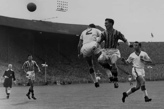 Northern Ireland's Peter McParland (centre) scored both goals in the 1957 FA Cup final as Aston Villa defeated Manchester United. (Photo by Douglas Miller/Keystone/Getty Images)