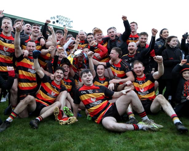 St Patrick's Cullyhanna players celebrate with the Ulster Intermediate Championship title.