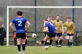 Millburn United's Liam Kerr opens the scoring against Rossowen. Pics: Brendan Monaghan