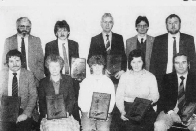 Front: Mr Derek Lockhart (Carparts), Mrs M McParland (Four Seasons Garden Centre), Mrs Margaret Morgan (Paige), Mrs A Dolaghan (Midmar), Mr Jim Taylor (Public Works Services. Back: Mr Frank Dolaghan, General Manager, Mournecraft; Mr Gabriel Byrne (Scissors), Mr Jim Kelly (Kelly-Magill), Mr Gerry McGivern (Promotions Supervisor, Mournecraft) and Mr Des Hayes (Manager, Mournecraft). They were pictured as a group of employers from the Newry and Mourne area were presented with copper plaques in recognition of their contribution to youth training at a lunch held in the Mournecraft Workshop.