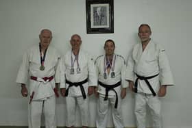 Pictured l-r:  Paul McConville ( gold at Masters), Nigel O'Neill (double Kata silver), Damien O'Hare (Double Kata silver), Dermot McCaul (Head coach and Masters attendee)