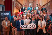 Guest speaker Matthew Bell, Eugene Prunty, South Eastern Regional College (Winner Hilary Sloan Award), Martin Flynn (Chief Executive) OCN and event compere Denis Watson picture with category winners and highly commended at the 2025 OCN Learning Endeavour Awards held at Titanic Belfast.