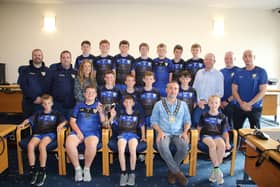 Jonesborough Primary School team for the 1st time in the school’s history won the Malachy McGeeney Cup and came home County Champions. Team is pictured with John McFearon, Eamonn Murphy Coaches, Acting Principal Marion Litter, Councillor Mickey Larkin, Coaches Philly McEvoy, Declan McCoy and the Jonesborough Primary School County Champions Team with Chairperson Newry, Mourne and Down Council, Councillor Philip Campbell who hosted a reception to recognise their achievement.