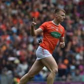 Armagh's Rian O Neill celebrates scoring his penaltv