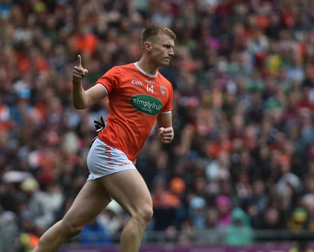 Armagh's Rian O Neill celebrates scoring his penaltv