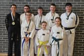 Newry's competitors at the recent Northern Irish TaeKwon-Do Championships: L-R, Ronan Lynch, Diarmuid McNamee, Kasper Kowalski, Coran McSherry, Lara McAleavy, Matthew Kowalski,Tessa McAleavy and Aidan Lynch.