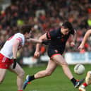Armagh's Callum O'Neill drives past Derry's Ethan Doherty and Conor Glass during their league meeting. Pic: John Merry