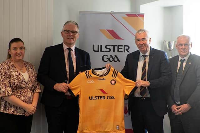 GAA President, Jarlath Burns, presents an Ulster GAA jersey to PSNI Chief Constable, Jon Boutcher, at Ulster GAA Headquarters in Armagh. Pic: GAA