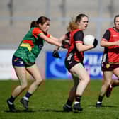Down's Eimear Fitzpatrick turns away from Carlow full-back Aoife Carroll at Pairc Esler on Sunday Pictures: Brendan Monaghan BM13
