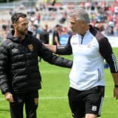 Galway Manager Pádraic Joyce greets his Down counterpart Conor Laverty on Sunday at Pairc Esler.