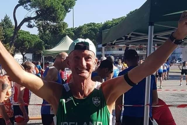 NCR member Terry O'Hare celebrates after he completed the  Pescara 10K.