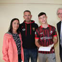 Ryan Cookson with Mum Vera, Dad Shaun and Principal St Colman's College, Cormac McKinney at the GCSE result Celebrations. INNR3423