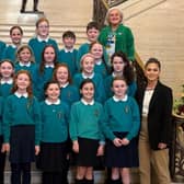 Aoife Finnegan MLA pictured with St Malachy's Primary School Camlough at the recent debate in Stormont.