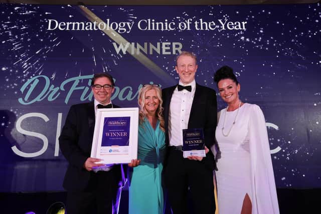 Garry McCabe, Elaine Campbell Murphy and Dr Finbar with Natasha Hayes from category partner, Church Pharmacy picking up the award for Dermatology Practice of the Year.