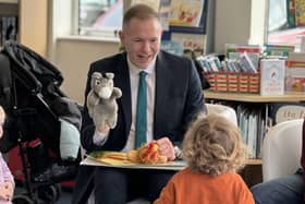 Sinn Féin MP Chris Hazzard takes part in a ‘Rhythm and Rhyme’ session at Warrenpoint Library.