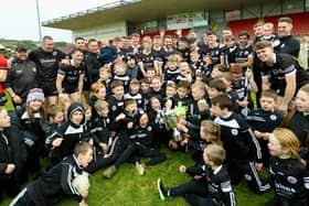 Kilcoo players and their supporters celebrate winning the Down Senior Football Championship final at Pairc Esler. Picture by Gareth Carville.