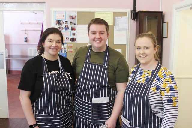 Hard at work in the kitchens on the morning of Newry Show' Big Breakfast: Philip Moffett with Sarah McGivern (left) and Emma Porter.