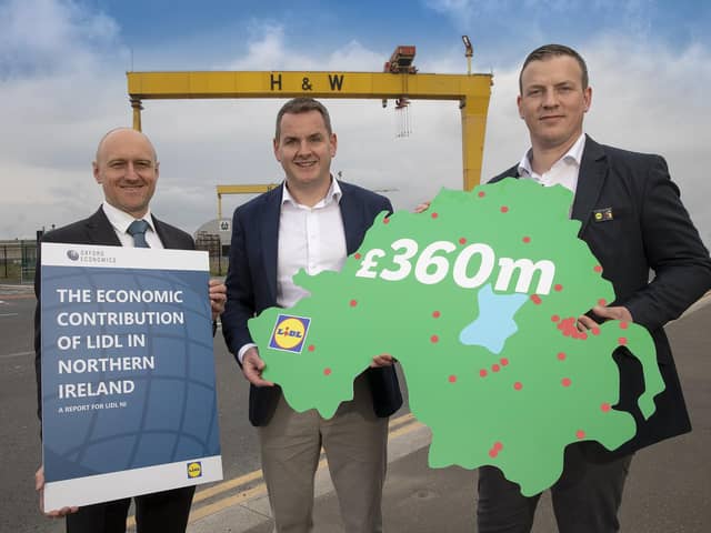 Pictured as a new report marking its 25th anniversary reveals that Lidl Northern Ireland pumped a record £360 million into the local economy in 2023, doubling its annual economic contribution over the past five years, are from left, the report’s author Neil McCullough, Associate Director, Oxford Economics, J.P. Scally, Chief Executive Officer Lidl Ireland and Northern Ireland, and Ivan Ryan, Regional Managing Director, Lidl Northern Ireland.