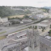 Image of Newry Cathedral and artist's impression of the new NMDDC Civic Centre. (Image from NMDDC website)