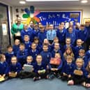 ​Poyntzpass PS children handed over £760 to Women’s Aid Armagh Down.