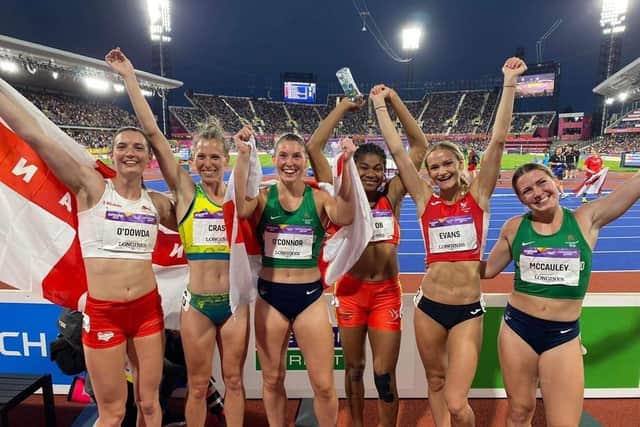 Newry's Kate O'Connor (centre) who will represent Ireland in heptathlon at the Olympic Games celebrates winning silver at the 2022 Commonwealth Games in Birmingham.