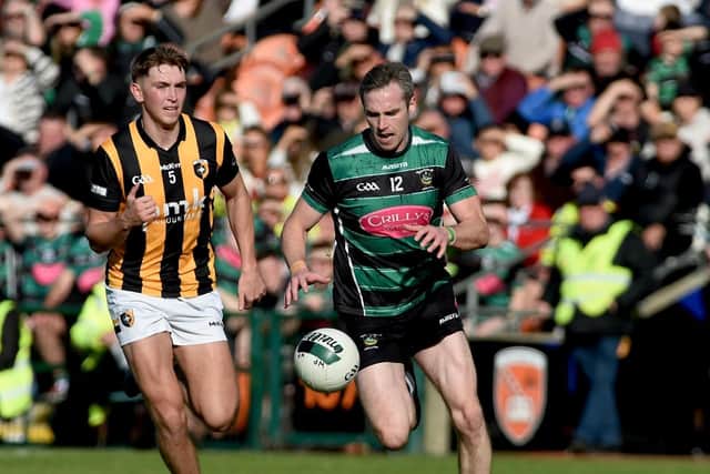Killeavy captain Ciaron O'Hanlon is chased down by Crossmaglen defender Odhran Caraher.