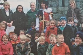 One of three classes from Seaview Nursery School which visited The Keep at Narrow Water Castle, pictured with warden James McEvoy and principal Miss Sheila McGinniss.