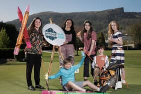 Competition judge and award-winning artist,  Kathryn Callaghan and Tourism NI Communications Officer, Claire Hamilton along with budding young artists at the launch of the Giant Welcome Art Competition