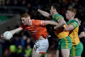 Armagh's Ciaran Mackin with Donegal's Eoghan Ban Gallagher and Stephen McMenamin