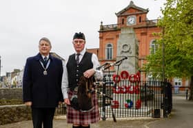 Chairman of the Newry Branch RBL, Colin Whiteside, with Pipe Major David Hanna MBE, at Newry Cenotaph, Monday 22nd April 2024.