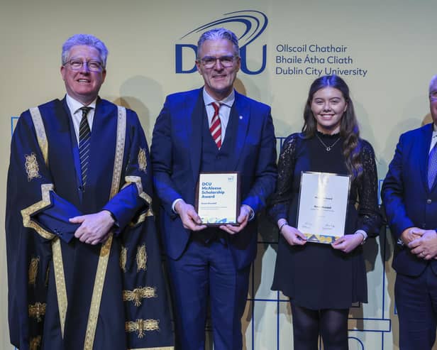 Roísín Dowdall, Bachelor of Education (Primary Teaching), St Paul's High School, Newry with Principal Jarlath Burns, Professor Dáire Keogh (DCU President, far left) and Joe Quinsey (CEO, DCU Educational Trust)