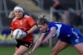 Armagh's Lauren McConville goes around Laois's Sarah Ann Fitzgerald