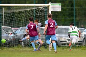 Newry Celtic striker Caolan Gray beats Villa keeper Conor McAteer to score his second goal at Derrylecka. Pictures: Brendan Monaghan