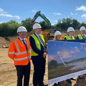 Infrastructure Minister John O'Dowd with Taoiseach Simon Harris, Tánaiste Micheál Martin and representatives of the Irish Government and Louth County Council.