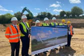 Infrastructure Minister John O'Dowd with Taoiseach Simon Harris, Tánaiste Micheál Martin and representatives of the Irish Government and Louth County Council.